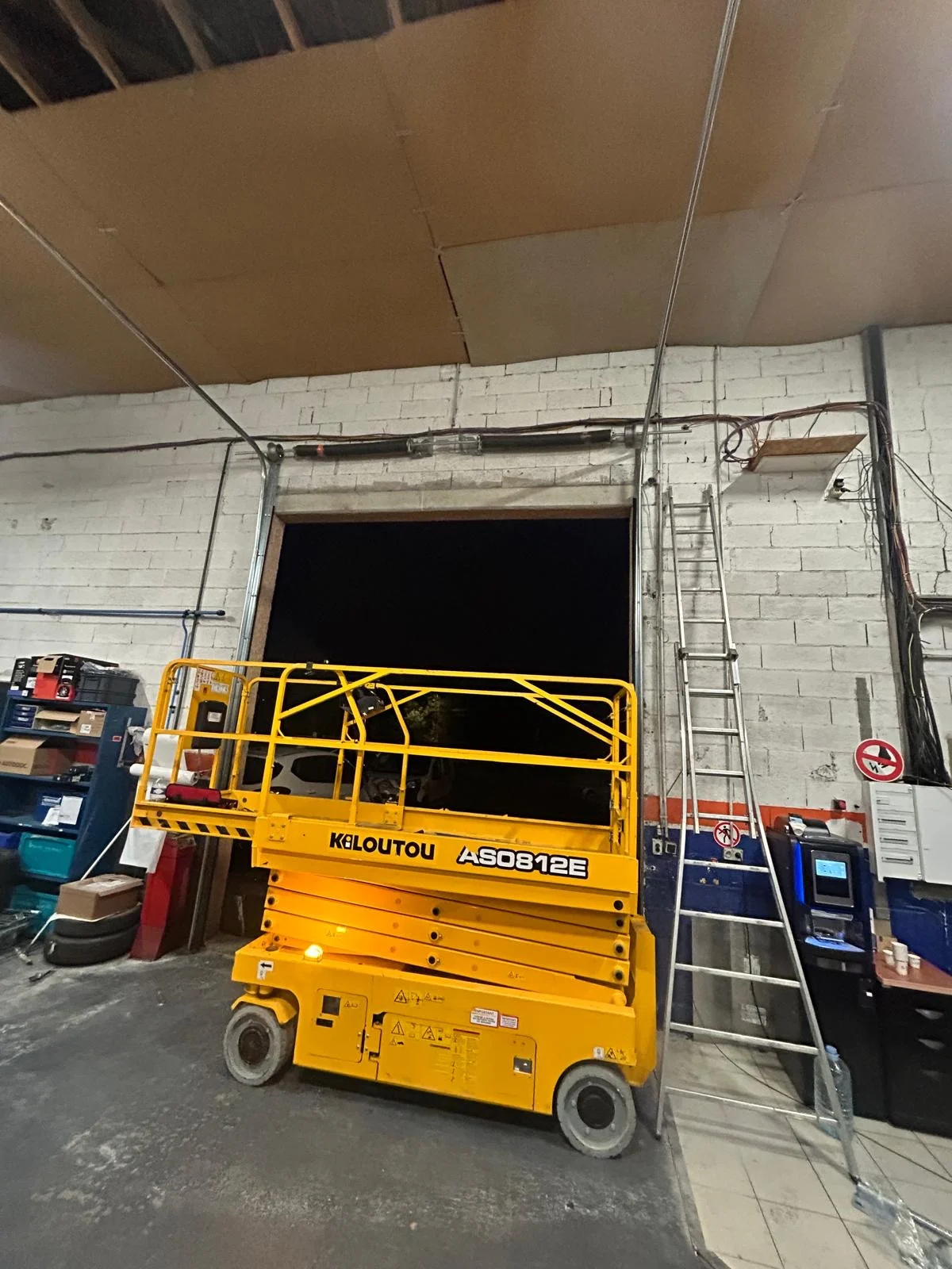 Mise aux normes et sécurisation - porte sectionnelle Paris